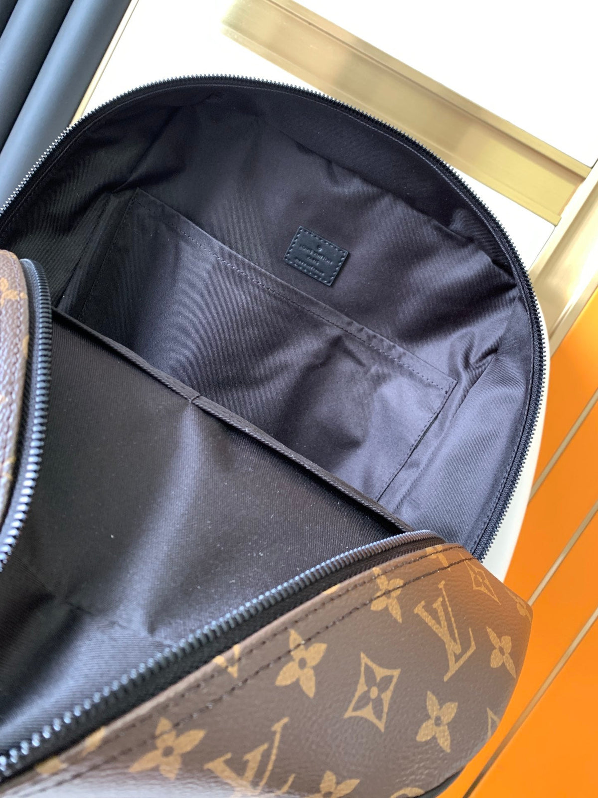 DEAN BACKPACK 42 IN BLACK AND BROWN MONOGRAM CANVAS