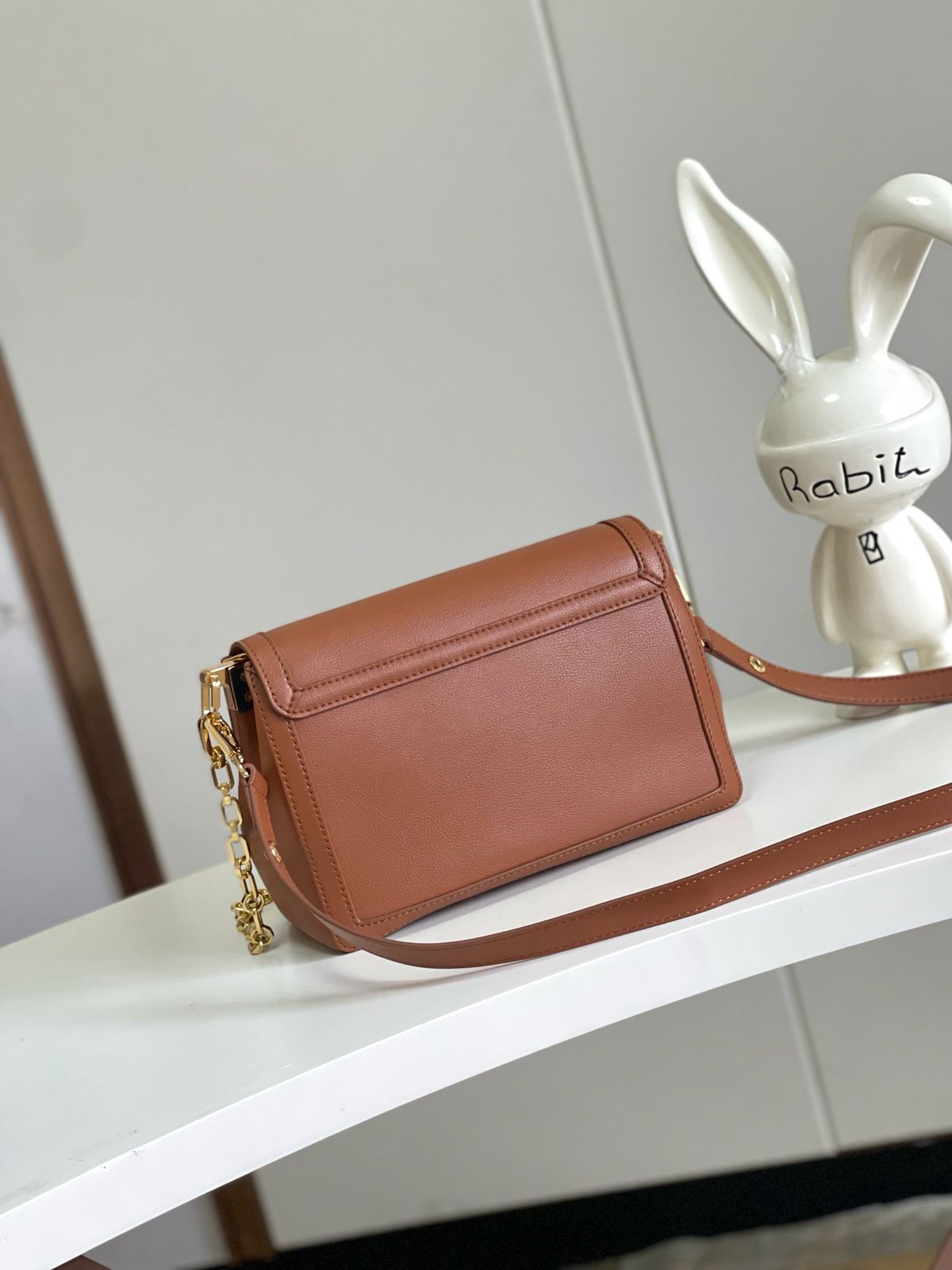 DAUPHINE SOFT MM 24 IN COGNAC CALFSKIN GOLD HARDWARE