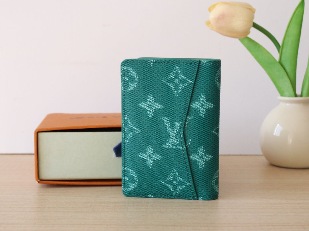 LV Pocket Organizer Monogram Heritage Canvas
