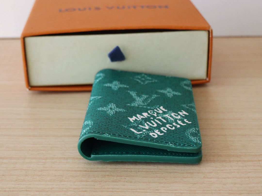 LV Pocket Organizer Monogram Heritage Canvas