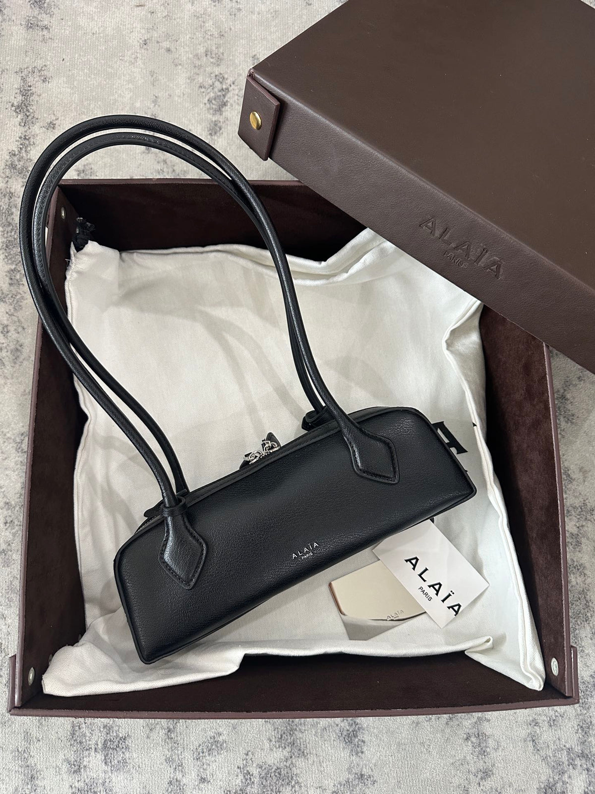 LE TECKEL SMALL BAG 27 IN BLACK GOATSKIN