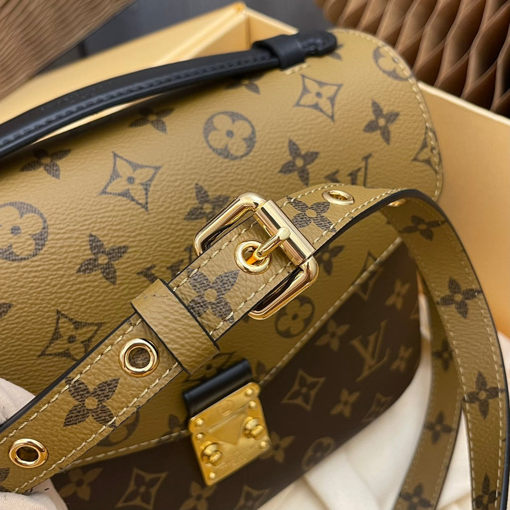 pochette metis 25 monogram reverse canvas