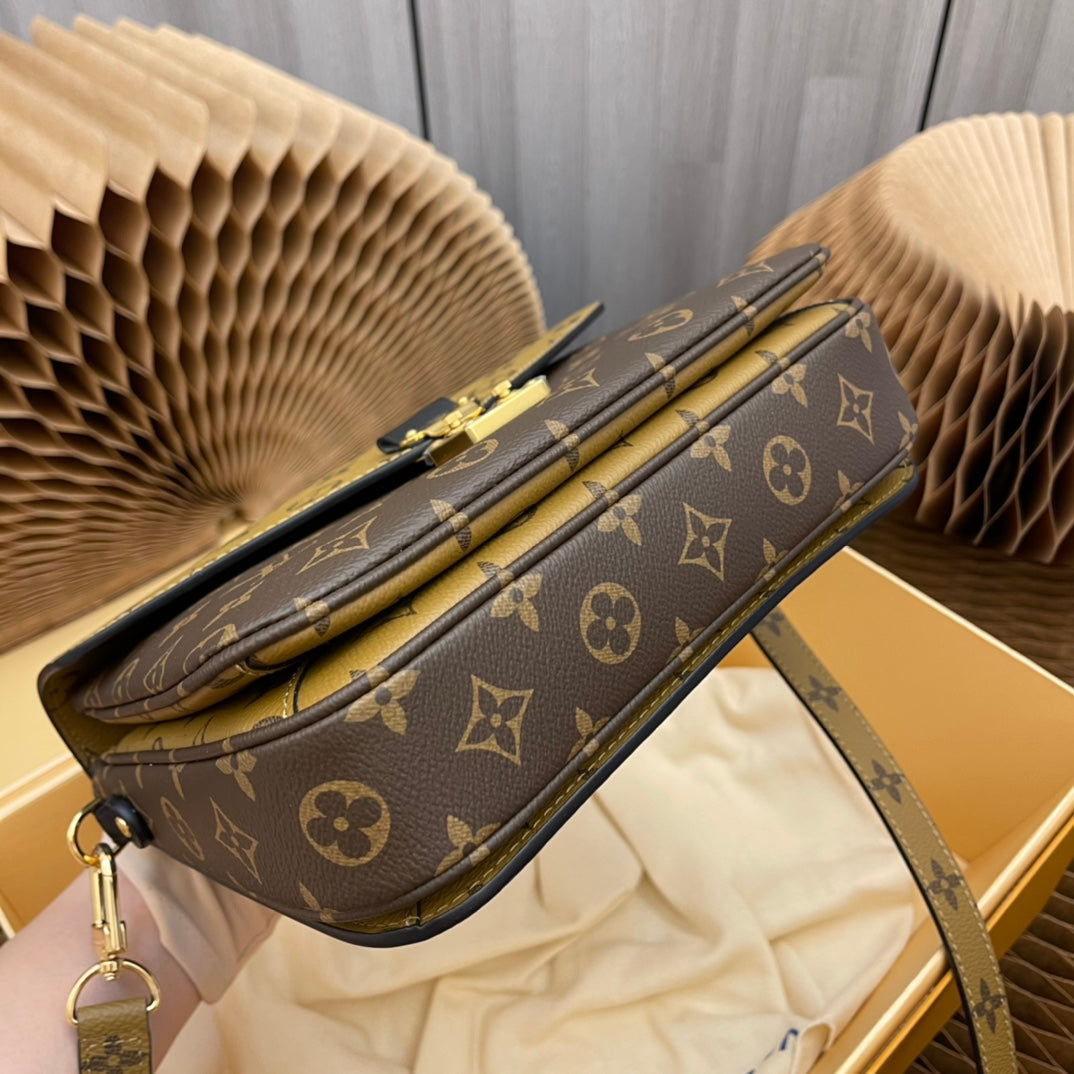 pochette metis 25 monogram reverse canvas