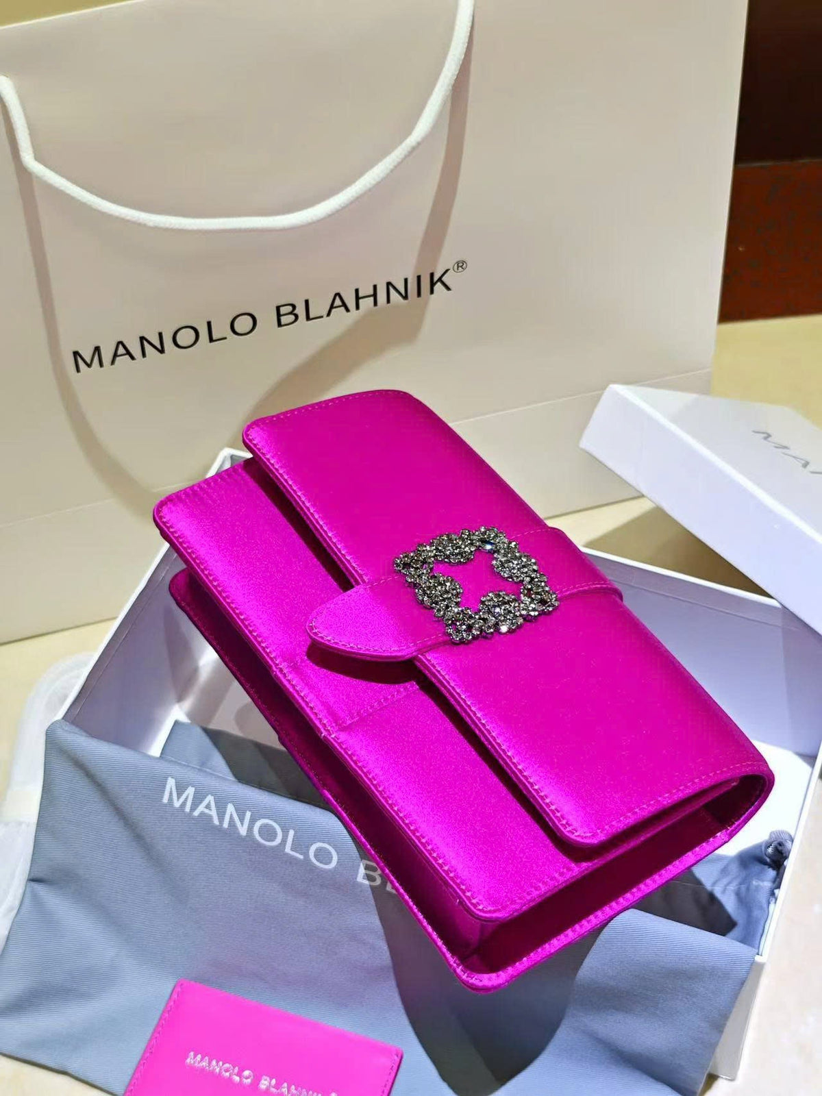 Manolo Capri embellished satin clutch in purple